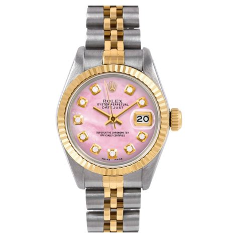 ladies mother of pearl 18k rolex watch